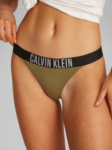 Slip costum de baie de la Calvin Klein Swimwear pe verde: față