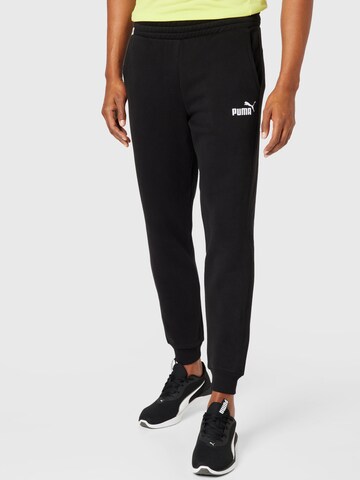 PUMA - Tapered Calças de desporto em preto: frente