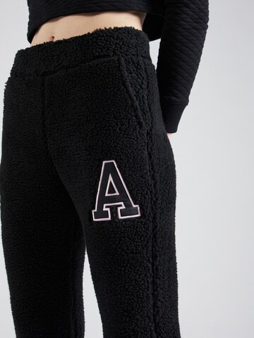 AÉROPOSTALE - Tapered Pantalón en negro