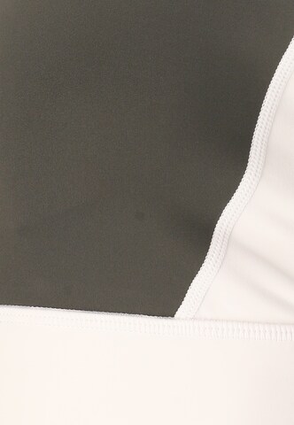 Athlecia Low Support Sports bra 'Aspasia' in Brown
