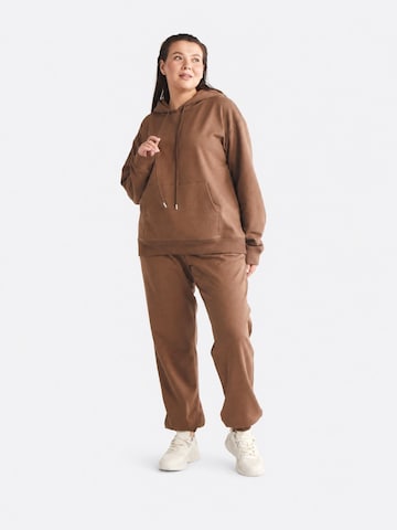 Pantaloni sportivi di Ethiquet in marrone