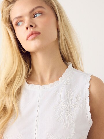 Haut Next en blanc