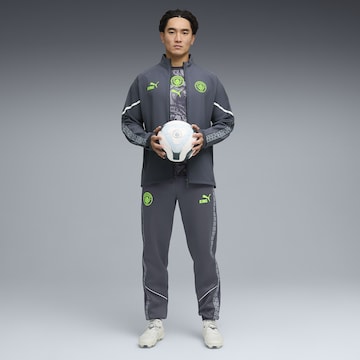 PUMA Tapered Sportbroek 'Manchester City King Anthem' in Grijs