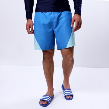 MAUI WOWIE Swimming Trunks in Blue: front