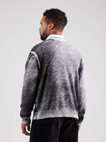 GUESS Originals Pullover in Schwarz
