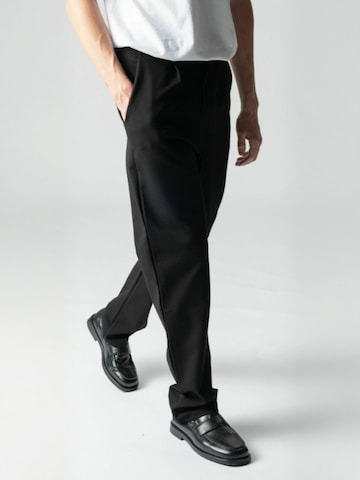 TEESHOPPEN - regular Pantalón ' Wide ' en negro