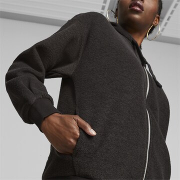 PUMA Sweatjacke 'Her' in Schwarz