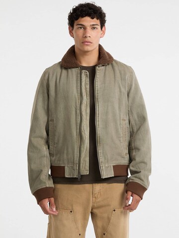 GUESS Between-Season Jacket in Green: front