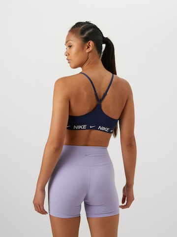 Bustier Soutien-gorge de sport 'INDY' NIKE en bleu