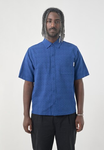 Cleptomanicx Regular fit Button Up Shirt 'Facemelter' in Blue: front