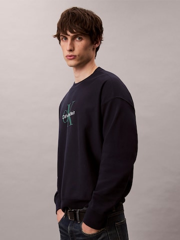 Calvin Klein Jeans Mikina – modrá