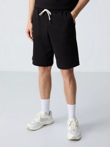Tuta da jogging di Tommy Life in nero