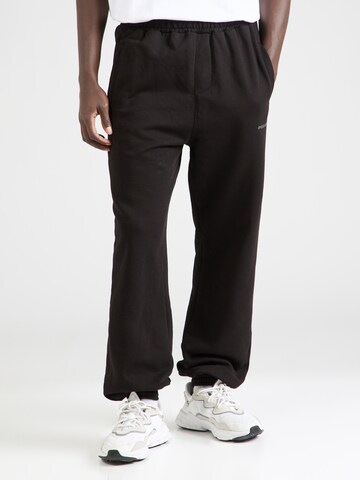 Pegador - Tapered Pantalón en negro: frente