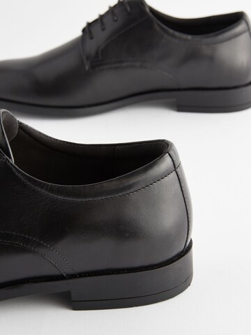 Chaussure à lacets Next en noir