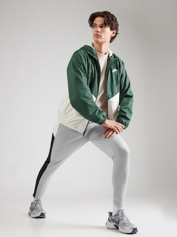 NIKE Ozke Športne hlače 'Academy 25' | siva barva