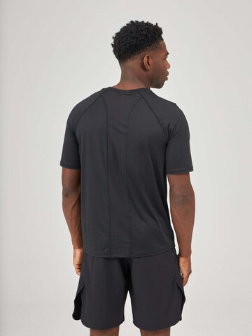 SNOCKS Functioneel shirt in Zwart