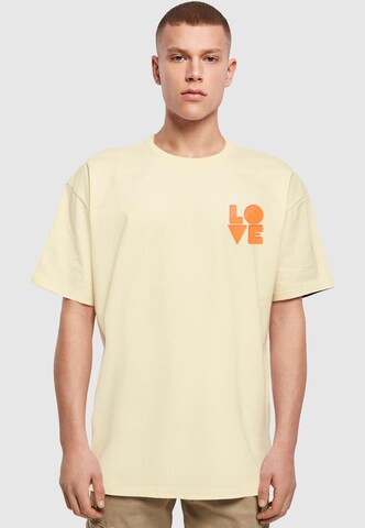 T-Shirt 'Hugs & Love - Love' Merchcode en jaune : devant