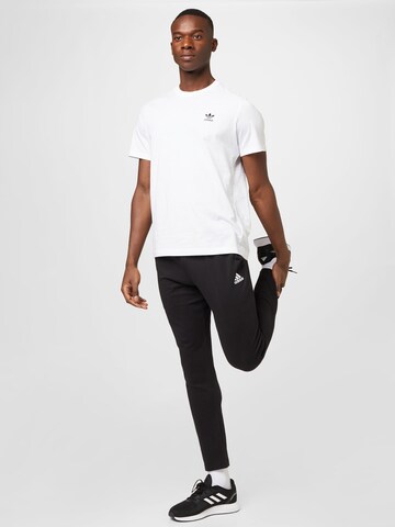 ADIDAS SPORTSWEAR regular Sportsbukser 'Essentials Tapered Open Hem' i sort
