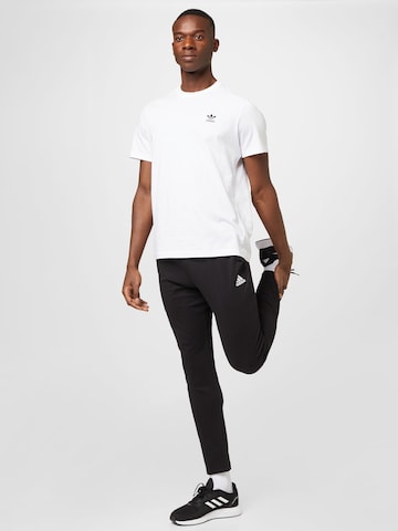 ADIDAS SPORTSWEAR Normalny krój Spodnie sportowe 'Essentials Tapered Open Hem' w kolorze czarny
