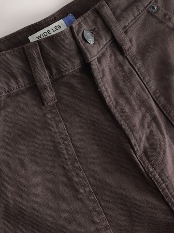 Next - Perna larga Calças de ganga em castanho