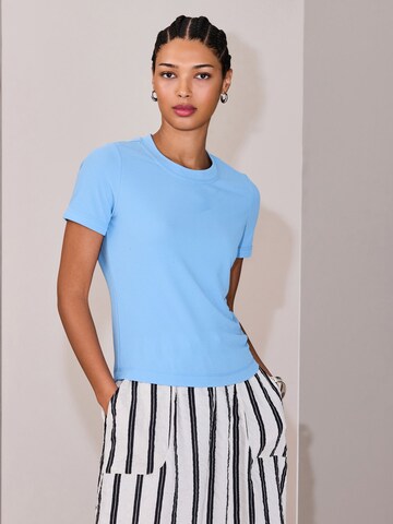 Next Shirt in Blue: front