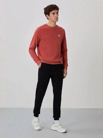 Tommy Life Joggingpak in Rood