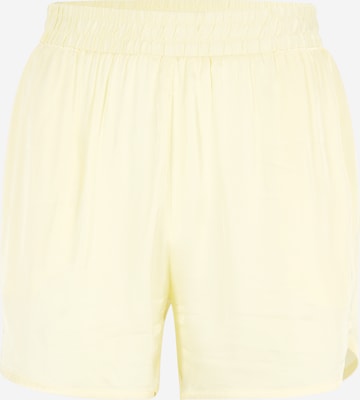 Urban Classics Loose fit Pants in Yellow: front
