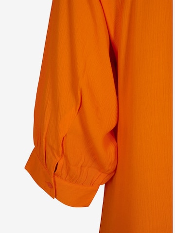 Tunica 'Erose' di Zizzi in arancione