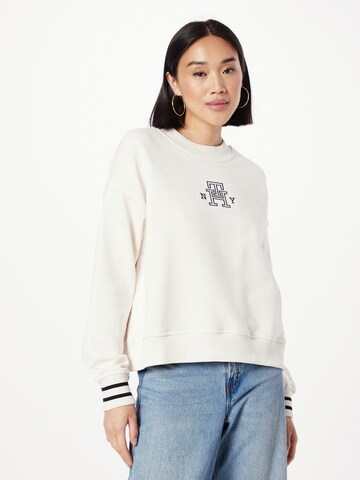 Sweat-shirt TOMMY HILFIGER en beige : devant