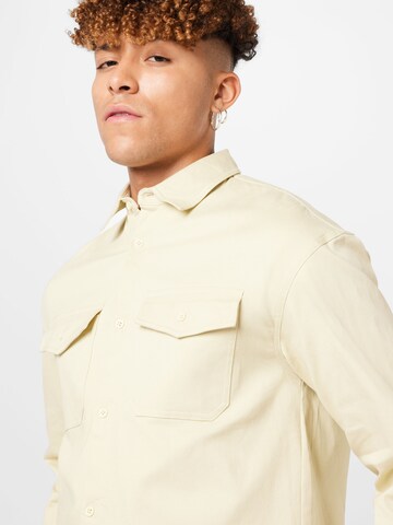 ABOUT YOU x Alvaro Soler Regular fit Button Up Shirt 'Gino' in Beige