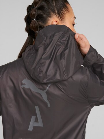 PUMA Sportjacke in Schwarz