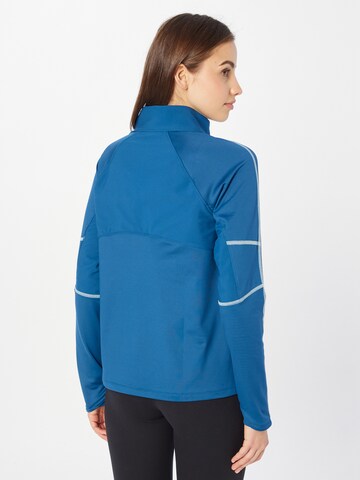 UNDER ARMOUR - Sudadera con cremallera deportiva en azul