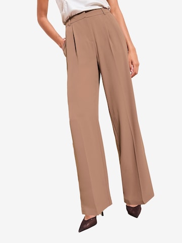 Friends Like These Szeroka nogawka Spodnie w kant w kolorze beżowy: przód