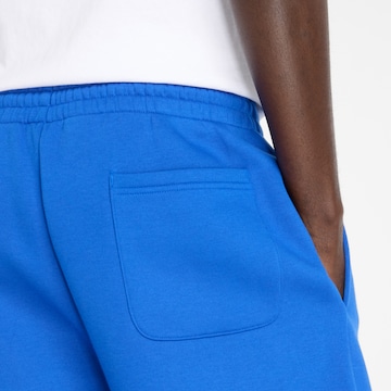 new balance Tapered Broek 'Essentials' in Blauw