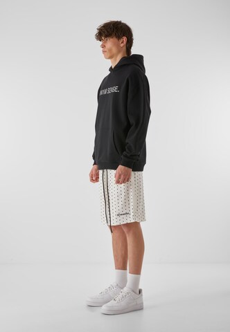 9N1M SENSE Loosefit Shorts in Schwarz