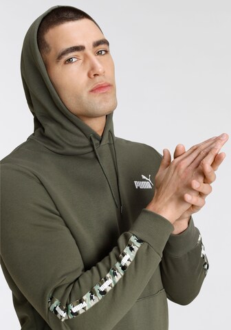 PUMA Sports sweatshirt in Green