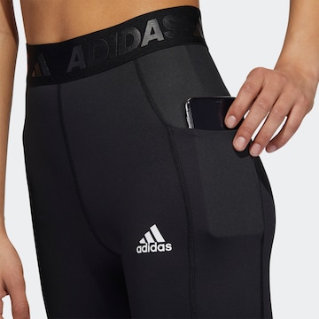 ADIDAS SPORTSWEAR Skinny Urheiluhousut värissä musta