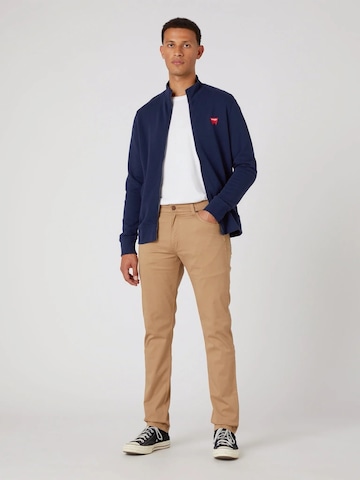 WRANGLER Slimfit Jeansy 'LARSTON TIGERS EYE' w kolorze beżowy