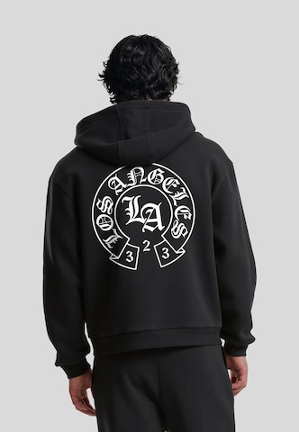 Veste de survêtement 'LA Dynasty' Mister Tee en noir : devant