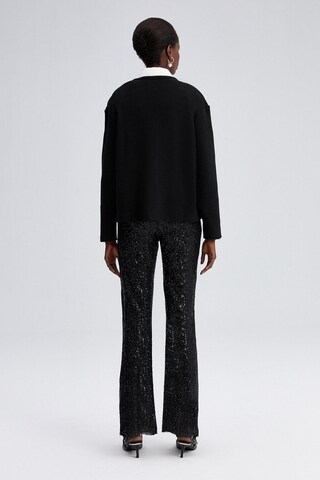 Touche Prive Strickjacke in Schwarz