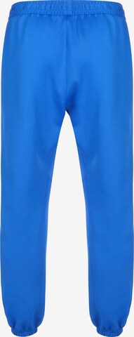 NIKE Tapered Sportbroek in Blauw