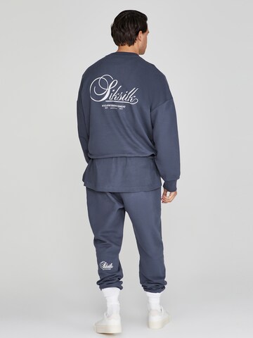 Sweat-shirt 'Graphic' SikSilk en bleu