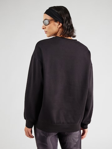 PUMA - Camiseta deportiva 'ESS' en negro