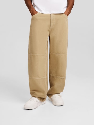 Bershka Loose fit Pants in Beige: front