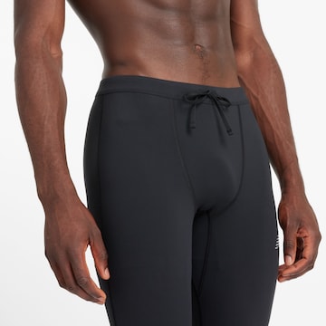 Skinny Pantalon de sport new balance en noir