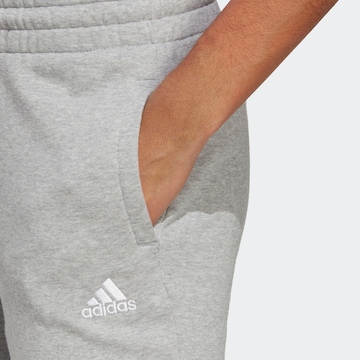 ADIDAS SPORTSWEAR Ozke Športne hlače 'Essentials' | siva barva