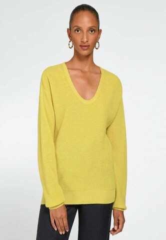 Pull-over include en jaune : devant