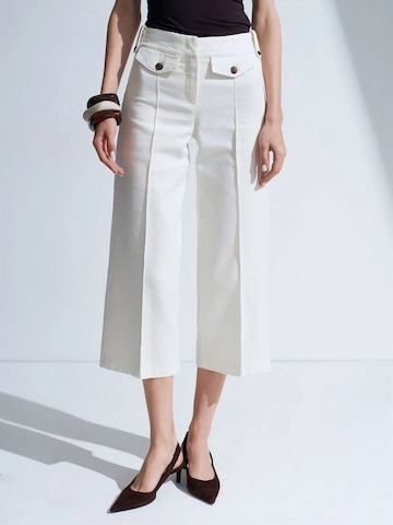 Wide leg Pantaloni di Dilvin in bianco