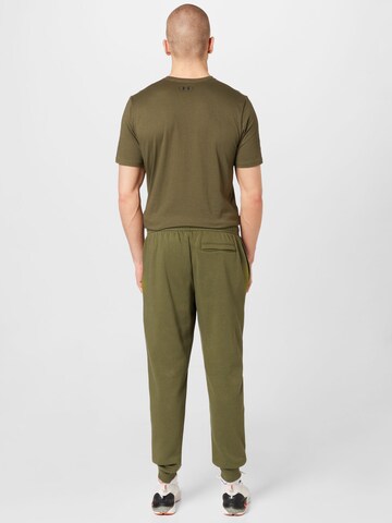 Tapered Pantaloni sportivi 'Rival' di UNDER ARMOUR in verde