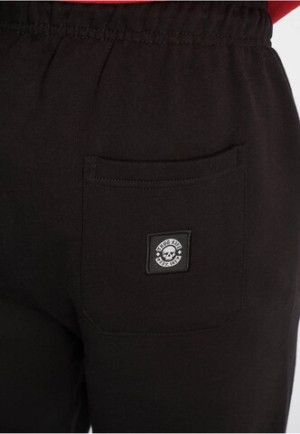 Tapered Pantaloni di Thug Life in nero